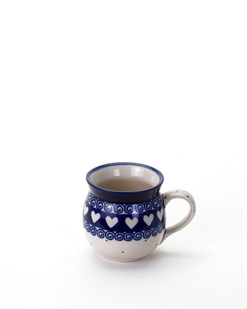 Traditional pottery made by Ceramika Artystyczna - the oldest pottery factory in Boleslawiec, Poland. Blue and green.