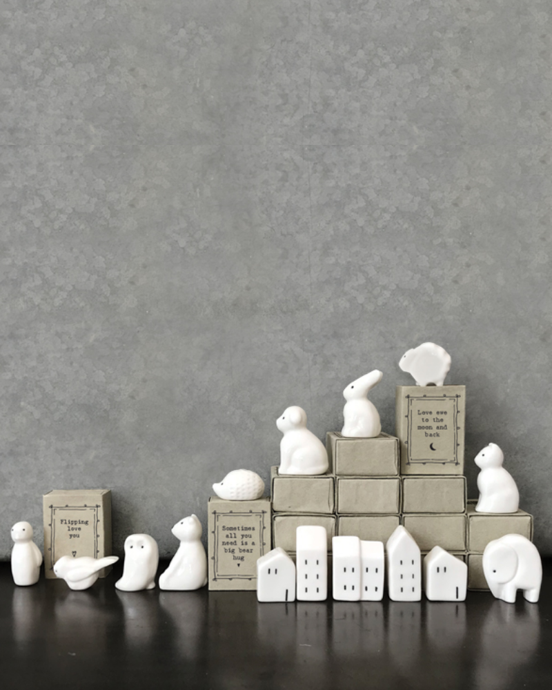 Standing at 4cm tall this little porcelain elephant is the perfect little gift for those you love! Presented in a little match box with the message "Remember you are loved". A lovely keepsake for anyone in need of some kind words. Collect them all. Comes in a mini gift box.