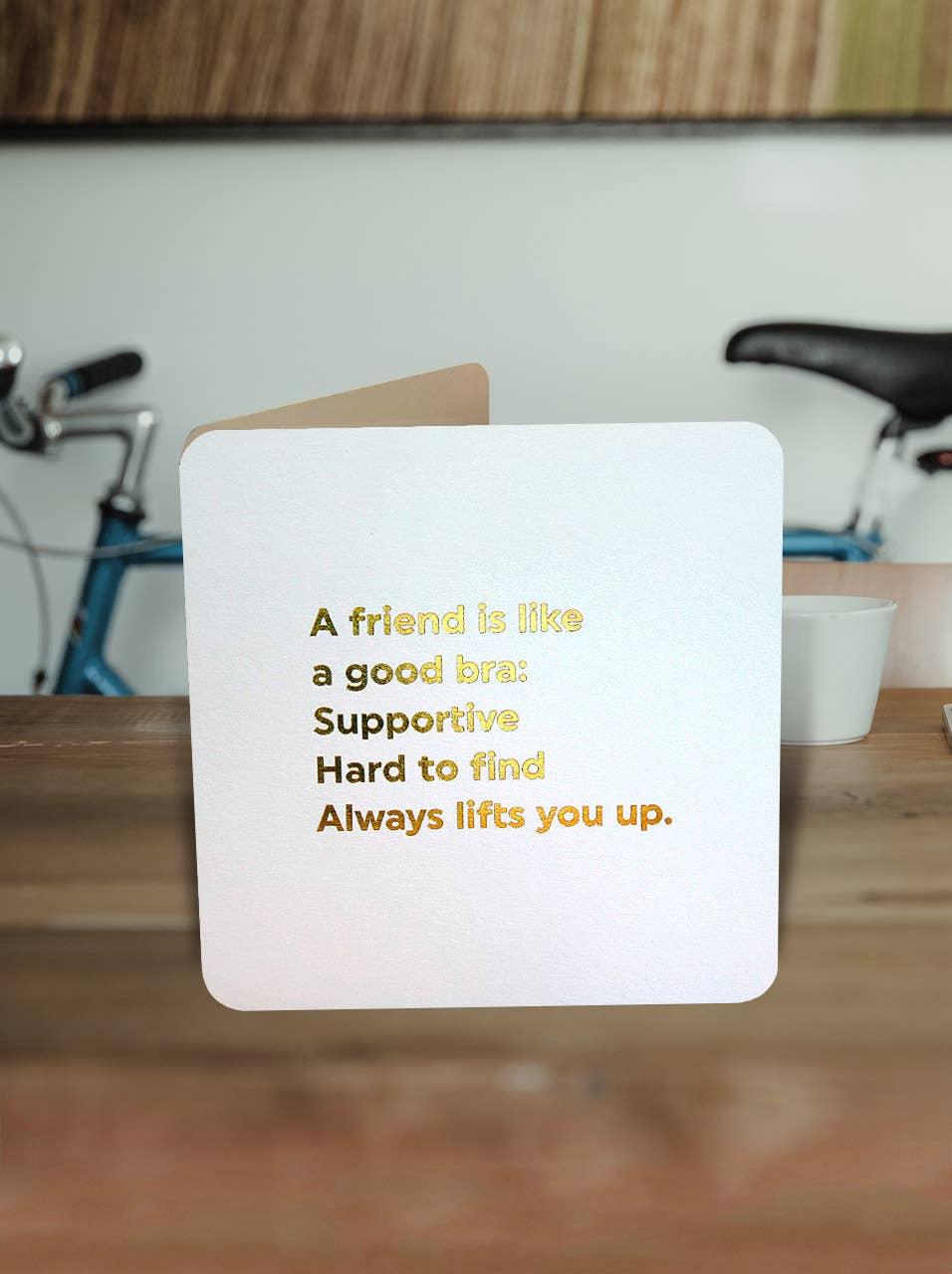 A Friend is Like a Good Bra Greeting Card