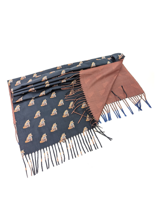 Large blue scarf with fox illustrations.
