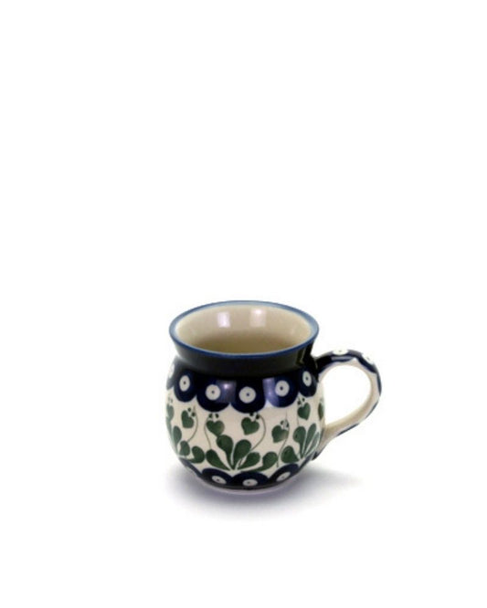 Traditional pottery made by Ceramika Artystyczna - the oldest pottery factory in Boleslawiec, Poland. Blue and green. 